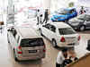 Car makers rev up launches to get past rough patch