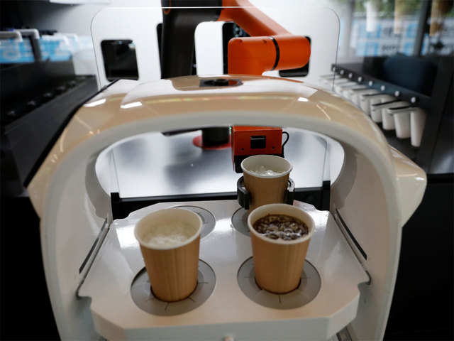 Robot takes order, makes & serves drink