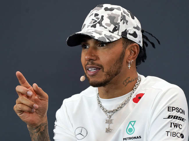 Hamilton, Formula One's first black world champion, spends much of his time in America and spoke out on the issue on Instagram on Sunday.
