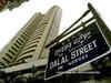 Sensex gains 200 points, Nifty tops 10,100; Voda Idea falls 4%