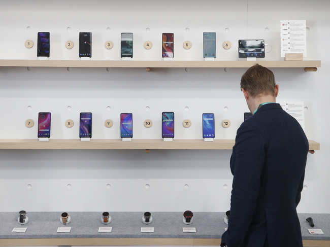 File photo in January, 2020: The Google exhibit building shows off a variety of devices with Google Assistant, including Android smartphones and Wear OS smartwatches during the CES tech show in Las Vegas.