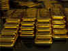 Gold prices steady near multi-year peak as virus fears mount