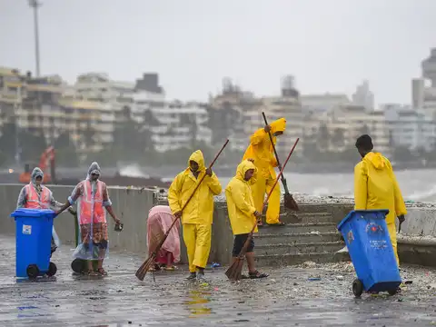 Cleaning garabage washed ashore