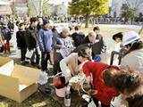 People line up for drinking water in Koriyama