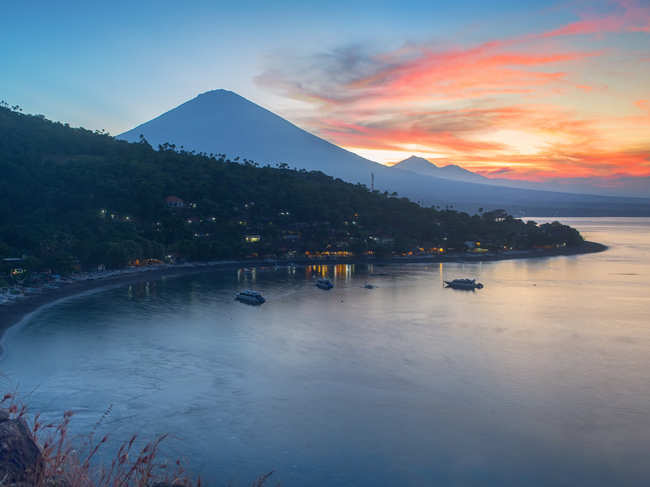 Sunset scenic view of Agung volcano from Amed village, Bali, Indonesia