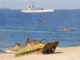 Indian Army's tanks drive towards the shore