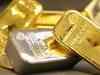 Gold trades flat; Silver off 31-year high