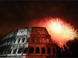 Fireworks explode over the ancient Colosseum