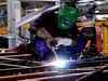 US manufacturing activity near 1-1/2-year high, factory job losses persist