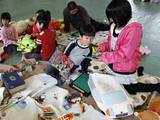 Evacuated children at relief shelter in Japan 