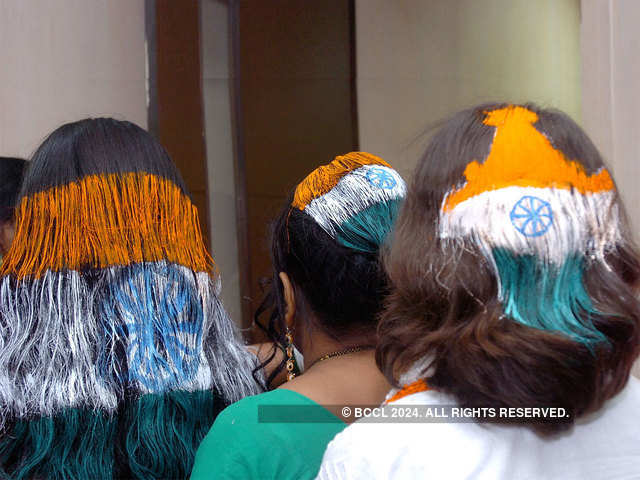People celebrates Independence Day by conducting Tiranga makeup and Tiranga hair colour.