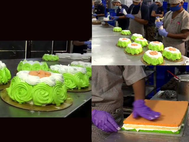 Tri coloured cakes and pastries being prepared at a bakery shop in Kolkata.