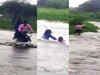 Watch: Two wheeler submerged in water as heavy rains lash parts of Maharashtra