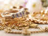 Gold, silver futures remain firm after opening higher