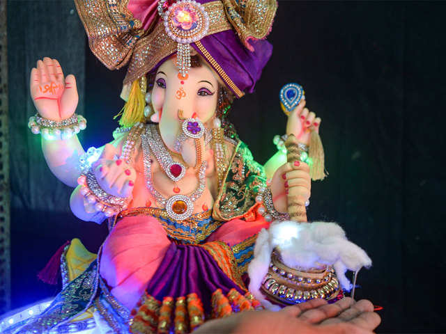 Ganesha Idol dispensing hand sanitiser