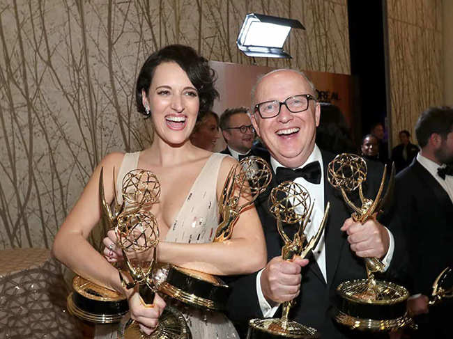 Phoebe Waller-Bridge and Harry Bradbeer ​showing off their awards at the 71st Primetime Emmy Awards 2019​ for 'Fleabag'.