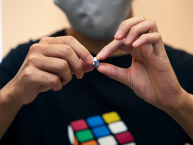 ​The Rubik's Cube ​measures just 9.9 millimeters, and weighs 2 grams​.