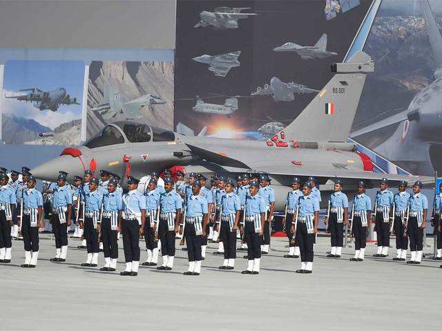 Indian Air Force (IAF) personnel marching during the full dress rehearsal  for the Airforce Day parade at the Hindon airbase. The Indian Air Force  conducted a full dress rehearsal including a fly