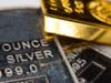 Gold inches lower on caution over US stimulus bill