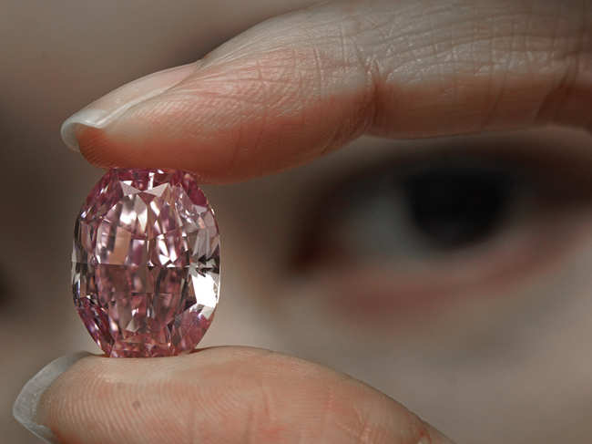 ​Named 'The Spirit of the Rose' after a famous Russian ballet, the 14.83-carat diamond is the biggest ever to go under the hammer in its category - 'fancy vivid purple-pink'.​
