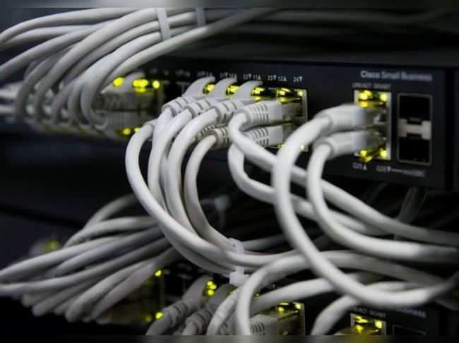 FILE PHOTO: Ethernet cables used for internet connection are seen at the headquarters of the Wnet internet service provider in Kiev