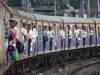 COVID-19 norms go for a toss as commuters cram local trains