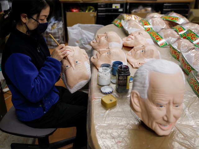 Workers of Ogawa Studios Co. are making rubber face masks of