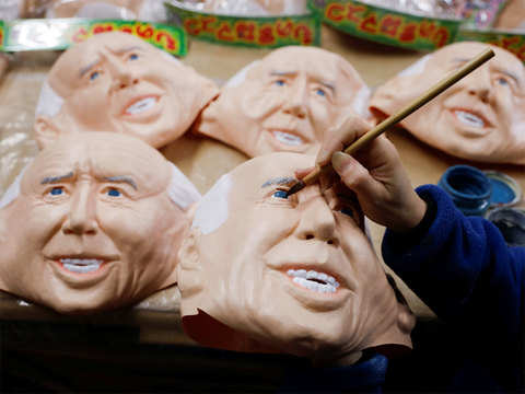 Workers of Ogawa Studios Co. are making rubber face masks of