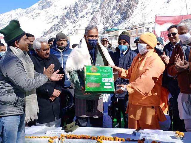 Yogi Adityanath with Trivendra Singh Rawat