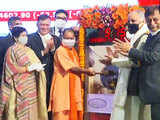 UP CM Yogi Adityanath rings the bell at BSE before listing of Lucknow Municipal Corporation bonds