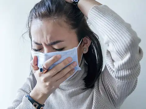 Coughing or sneezing