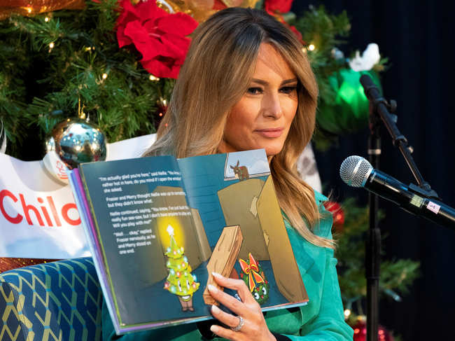 ​ Melania Trump reads a Christmas book to children who are patients at Children's National Hospital, in Washington, U.S.
