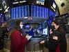 Wall St ends at record highs as investors eye stimulus