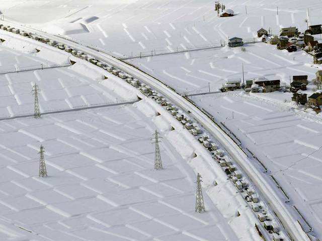 Record snowfall blankets parts of Japan