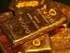 Gold rate slips as traders book profits