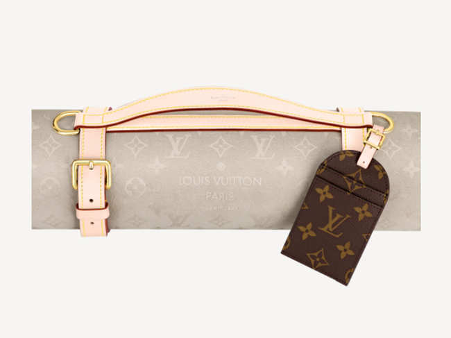 Louis Vuitton'​s yoga mat is made mostly of canvas with leather details and a cowhide carrying strap​.