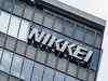 Nikkei edges near 30-year high on recovery hopes, heavy machinery stocks' gains