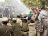 Rajasthan-Haryana border: Cops use water cannon, tear gas as farmers break through barricades