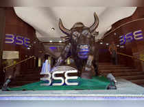 FILE PHOTO: A man walks out of the Bombay Stock Exchange building in Mumbai, India