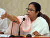 Mamata stands in queue to collect health scheme card
