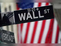 A Wall Street sign is pictured outside the New York Stock Exchange, in New York City