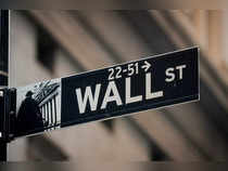 A Wall St. sign is seen near the NYSE in the financial district in New York