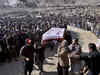 Pakistani Shiites end protests, hold funeral for 11 miners