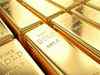 Gold near six-week low as firmer dollar weighs