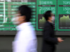 Asian equities make cautious gains following choppy day in US