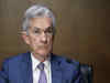 Powell bats down bond-taper talk, warning against an early exit