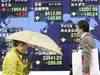 Asian stocks end mostly lower; S&P's US warning hurts sentiment