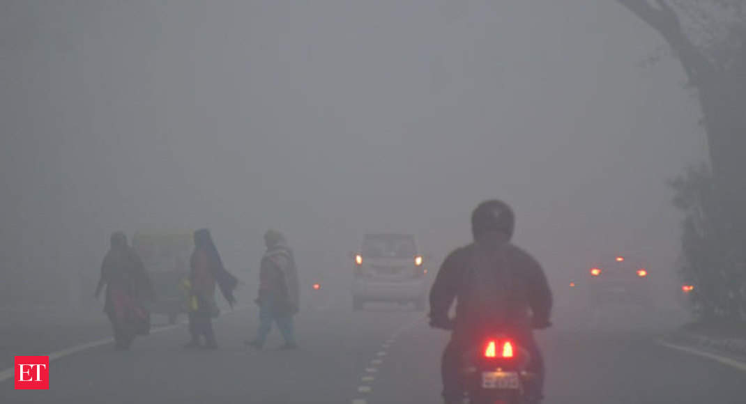 Dense fog engulfs Delhi amid intense cold wave, visibility affected - The Economic Times Video | ET Now