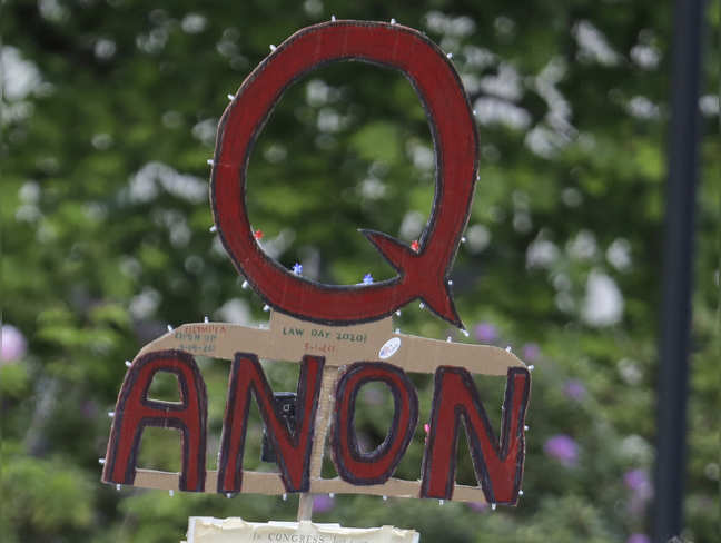 ​QAnon signage during a protest rally in Olympia, Wash, USA. ​