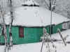 Heavy snowfall disrupts normal life in Kashmir Valley